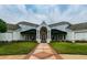 Elegant clubhouse with a landscaped entrance and inviting architecture for community gatherings at 442 Devon Pl, Lake Mary, FL 32746