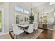 Dining room with decorative chandelier and mirrored wall at 442 Devon Pl, Lake Mary, FL 32746