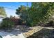 Flagstone backyard with mature trees and plenty of shade at 4913 E Wind St, Orlando, FL 32812