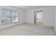 Bright living room showing access to a dining room at 4913 E Wind St, Orlando, FL 32812