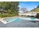 Private in-ground pool and beautiful landscaping at 4913 E Wind St, Orlando, FL 32812