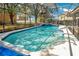 Sparkling pool and jacuzzi is enclosed by a screened-in lanai for outdoor fun at 511 Coventry Rd, Davenport, FL 33897