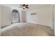 Bright bedroom with a large window and neutral decor at 607 S Glencoe Rd, New Smyrna Beach, FL 32168