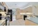 Bright kitchen with modern appliances and tile flooring at 607 S Glencoe Rd, New Smyrna Beach, FL 32168