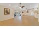Spacious living room with sliding glass doors leading to a patio area at 607 S Glencoe Rd, New Smyrna Beach, FL 32168