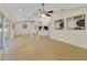 Spacious living room featuring wood floors and ample natural light at 607 S Glencoe Rd, New Smyrna Beach, FL 32168