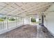 Spacious covered carport with fence, providing parking and shelter at 624 Illinois Ave, St Cloud, FL 34769