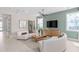 Comfortable living room with stylish decor, ample natural light, and modern furnishings at 6920 Dappled Oak Way, Orlando, FL 32829