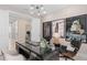 Modern office with a glass desk, stylish decor, and modern lighting at 6920 Dappled Oak Way, Orlando, FL 32829