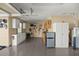 Well-organized garage with epoxy flooring, custom cabinets, and plenty of counter space at 8712 Sw 83Rd Cir, Ocala, FL 34481