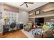 Comfortable home office featuring a desk, seating area, and ample natural light at 8712 Sw 83Rd Cir, Ocala, FL 34481