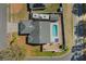 Aerial view of a home with a backyard pool, patio, RV parking, and fenced yard at 100 Diamond Ridge Blvd, Auburndale, FL 33823