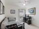 Cozy bedroom featuring a twin bed, desk area, and natural light from the window at 100 Diamond Ridge Blvd, Auburndale, FL 33823