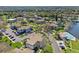 Aerial view of complex with a pond and community pool at 112 Windtree Ln # 203, Winter Garden, FL 34787