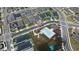 Community pool and gathering space in this aerial photograph at 1171 Lone Palm Way, St Cloud, FL 34771