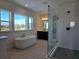 Bathroom features soaking tub, walk-in shower, and vanity at 13217 Tollcross Way, Winter Garden, FL 34787