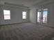 Spacious main bedroom with lots of windows and balcony at 13217 Tollcross Way, Winter Garden, FL 34787