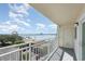 Condo balcony overlooking the ocean with a view of a bridge and buildings in the distance at 145 N Halifax Ave # 601, Daytona Beach, FL 32118