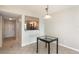 Open concept dining area flows into kitchen and features a modern light fixture at Harbor View condo at 145 N Halifax Ave # 601, Daytona Beach, FL 32118