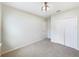 Bedroom with a closet and a window that allows natural light in and a ceiling fan at 15120 Zenith Ave, Mascotte, FL 34753