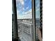 Stunning city views from this condo balcony with a sunny sky backdrop at 155 S Court Ave # 2106, Orlando, FL 32801