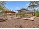 Inviting backyard featuring a wooden pergola and deck, perfect for outdoor relaxation and entertaining at 2643 Nova Dr, Apopka, FL 32703