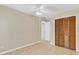 Bedroom with tile floor, closet, and entrance to ensuite bathroom at 2643 Nova Dr, Apopka, FL 32703