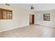 Living room with neutral walls, tile floors, and several windows at 2643 Nova Dr, Apopka, FL 32703