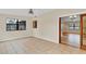 Bright living room featuring tile floors, a window and sliding doors at 2643 Nova Dr, Apopka, FL 32703