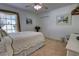 Cozy bedroom with neutral carpet and window at 304 Silver Pine Dr, Lake Mary, FL 32746