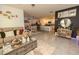 Stylish open-concept living space flowing into the kitchen and dining area, perfect for entertaining and Gathering gatherings at 3332 Logan Berry Dr, Mount Dora, FL 32757