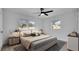 Serene bedroom with natural light, ceiling fan, and stylish decor at 3627 Arch St, Orlando, FL 32808