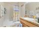 Bathroom featuring a shower-tub combo and a single sink vanity at 3640 Solana Cir # A, Clermont, FL 34711