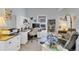 Comfortable home office with a work station, bookshelves, and stylish seating area for relaxing at 3640 Solana Cir # A, Clermont, FL 34711