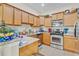 Kitchen featuring stainless steel appliances, granite countertops, and plenty of storage space at 3640 Solana Cir # A, Clermont, FL 34711