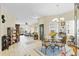 Spacious open-concept design blending the dining, living, and kitchen areas for seamless living at 3640 Solana Cir # A, Clermont, FL 34711