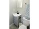 Bathroom with a gray vanity, toilet, and a decorative hand towel at 3708 Merryweather Dr, Orlando, FL 32812