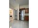 The kitchen features stainless steel appliances and a pantry at 3719 Madbury Cir, Lakeland, FL 33810