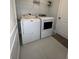 A laundry room with a washer and dryer at 3719 Madbury Cir, Lakeland, FL 33810