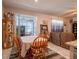 Dining area with sliding glass doors and views of the screened-in porch at 3861 Hanworth Loop, Sanford, FL 32773