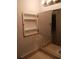 Small bathroom features a mirror and medicine cabinet at 4275 Perkinshire Ln # 204, Orlando, FL 32822