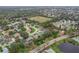 An aerial view shows the neighborhood in which the home is located at 460 Quail Hill Dr, Debary, FL 32713