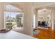 View from hall of a dining room area featuring a dining table and window at 460 Quail Hill Dr, Debary, FL 32713