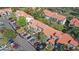 Elevated aerial view showcasing the building exteriors, parking, and manicured grounds at 4713 Capri Pl # 190, Orlando, FL 32811