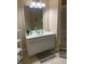 Bathroom featuring a large mirror, vanity with sink, and tile flooring at 5000 Cayview Ave # 10108, Orlando, FL 32819