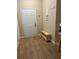 Welcoming entryway features wood-look tile floors and a convenient bench at 5000 Cayview Ave # 10108, Orlando, FL 32819