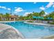 Enjoy the community pool featuring ample seating and covered lounging areas at 5000 Cayview Ave # 10108, Orlando, FL 32819