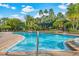 Relaxing community pool area with lounge chairs and lush landscaping at 5000 Cayview Ave # 10108, Orlando, FL 32819