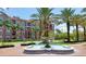 Beautiful fountain with a backdrop of lush tropical landscaping and attractive buildings at 5000 Cayview Ave # 10108, Orlando, FL 32819