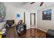 Bedroom featuring hardwood floors, desk, and a ceiling fan at 5140 Honeynut Ln, Windermere, FL 34786